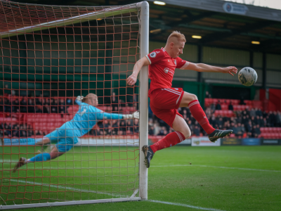 What five scout-ready metrics do non-league strikers need to hit to attract championship clubs